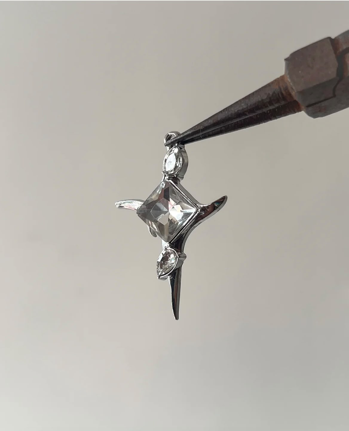 Stone cross charm