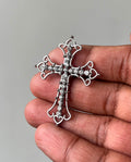 Iced out cross charm